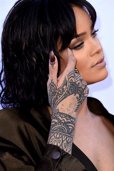 rihanna tattoo|rihanna hand tattoo maori.